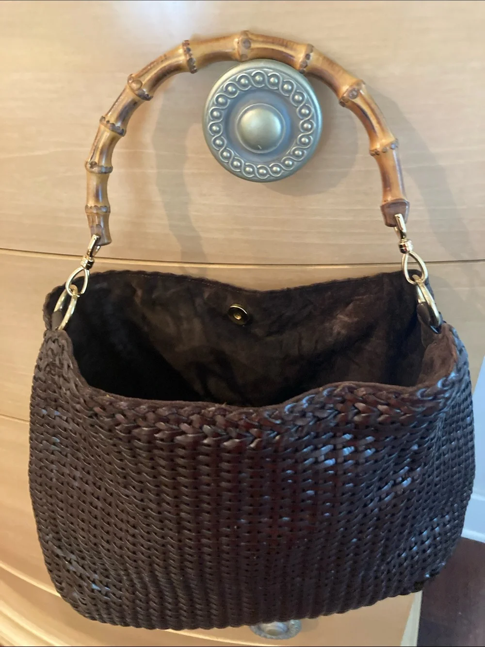 Brown leather/Suede interiorHandbag Interior with Zip Pocket. Dust bag included.